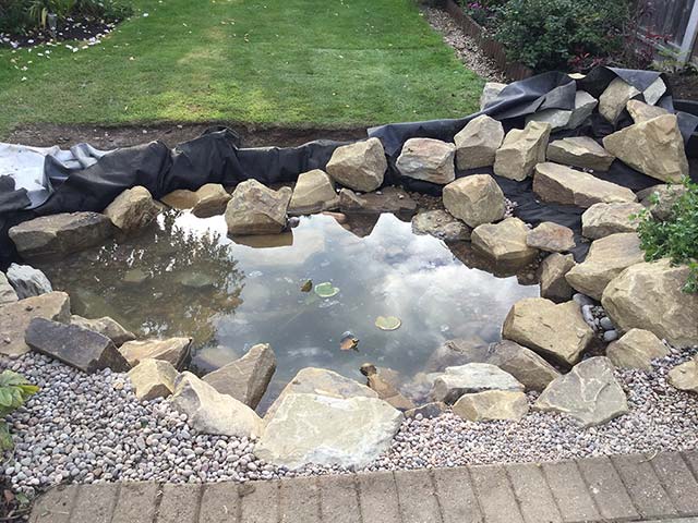 Finishing placing rocks
